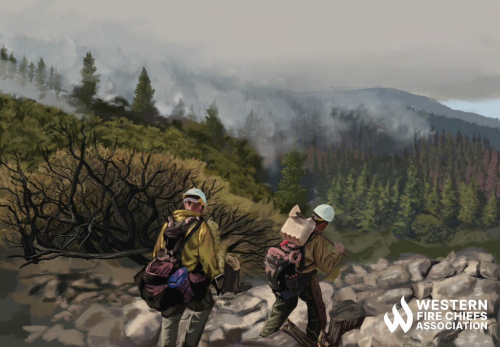 Two people wearing safety helmets carry heavy packs and bags of gear down a rocky slope, towards a forest. Smoke is rising from the trees.