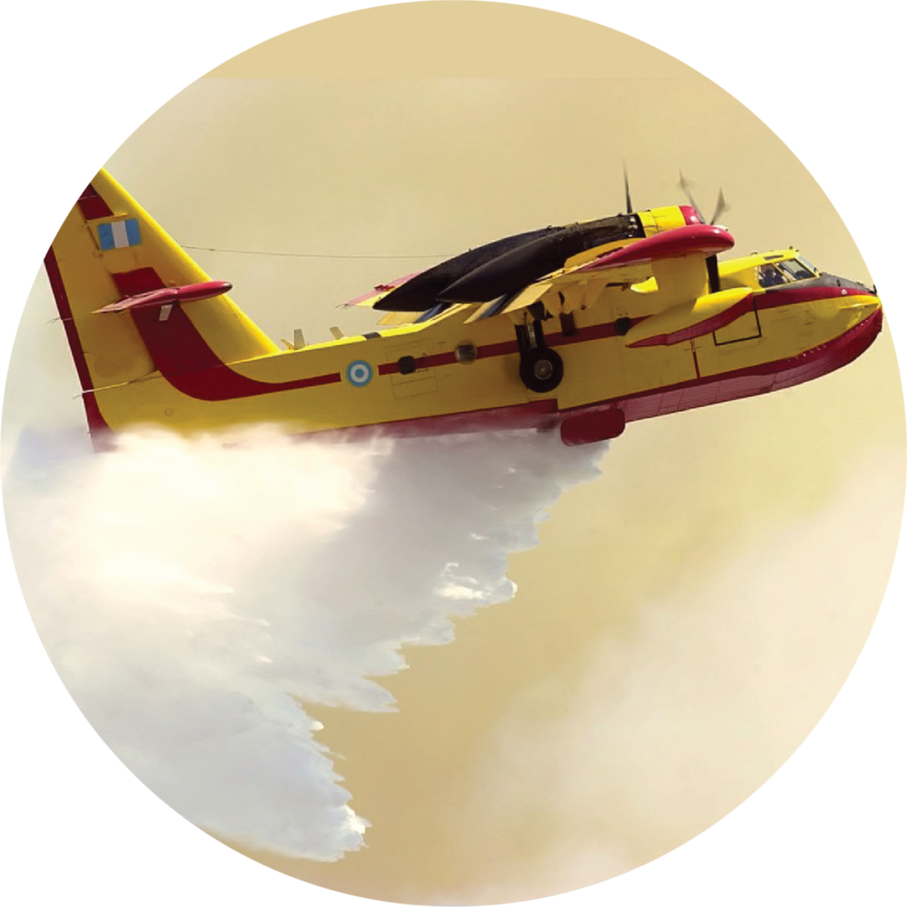 A small yellow plane with red on the underside & red side stripes. It is dumping water from the underside.