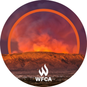 Circle, Branded. The glow of fire behind the orange mesa is highlighted with an orange semi-circle.